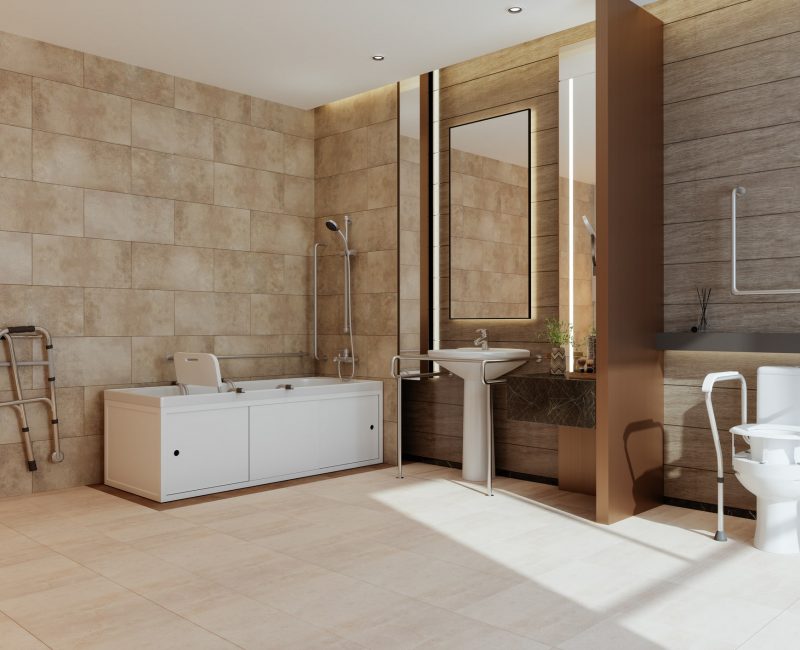 Side View Of Modern Bathroom With Bathtub, Toilet And Sink For People With Disabilities Side View Of Modern Bathroom With Bathtub, Toilet And Sink For People With Disabilities