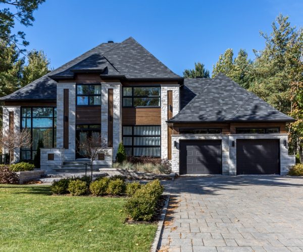 Terrebonne, Canada - October 19, 2015: Luxurious property located in Le Boisé de la pinière neighbourhood, a rich suburb of Terrebonne on a sunny day of autumn.
